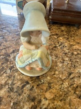 Porcelain Girl Figurine with Patchwork Quilt